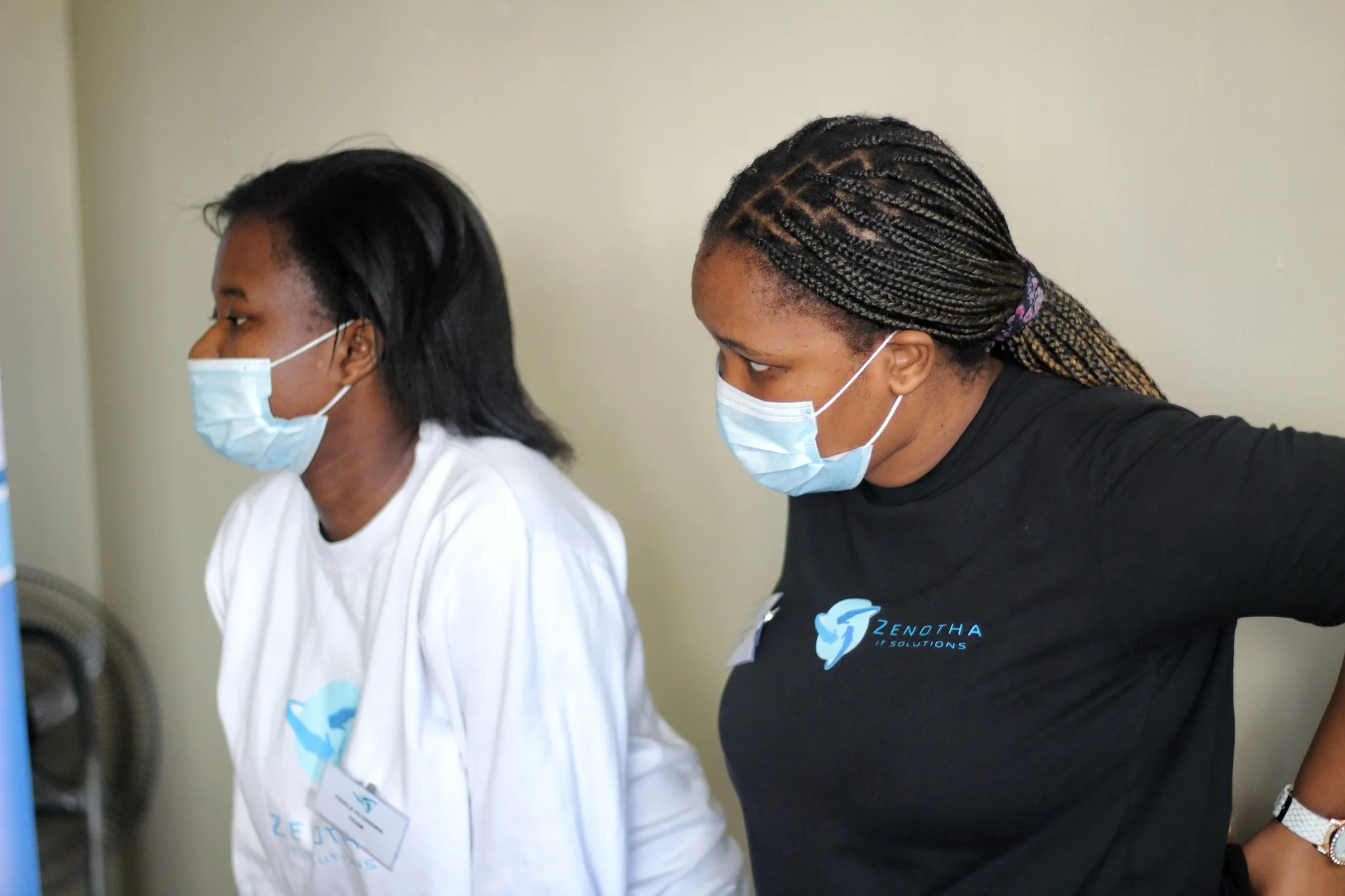 Two participants collaborating during a learning activity